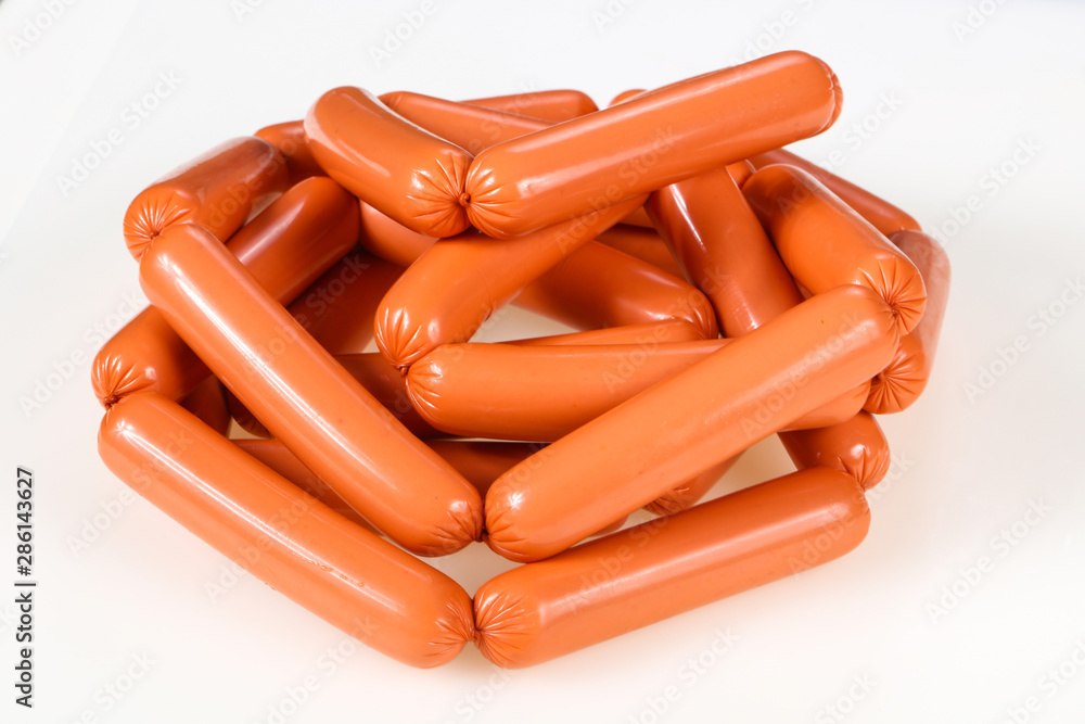 Tasty meat sausages over white background Tasty meat sausages over white background