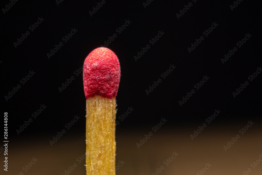 matchstick on black background