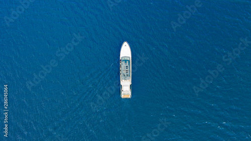 aerial top view luxury yacht sailing in sea