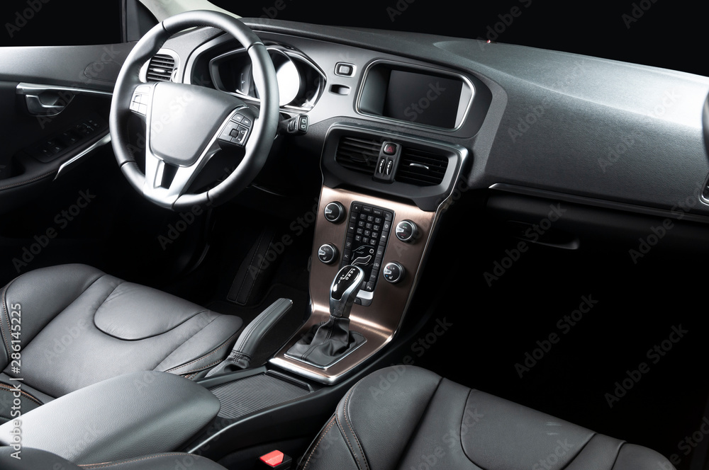 Luxury Car Interior - Steering Wheel, Shift Lever and  Dashboard.
