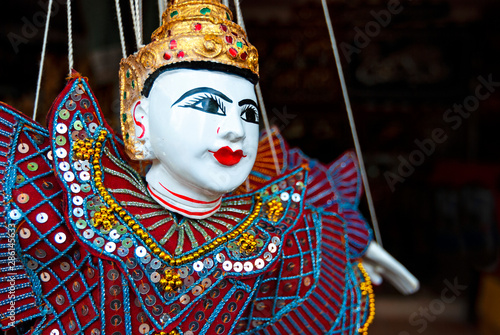 Portrait of a marionette in a local art and craft market in Yangon, Myanmar. photo