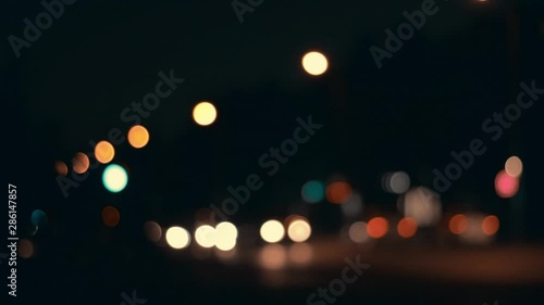 Wallpaper Mural Lights of the night city background. Defocus headlights of moving cars urban traffic. Abstract bright blured colored bokeh. Torontodigital.ca