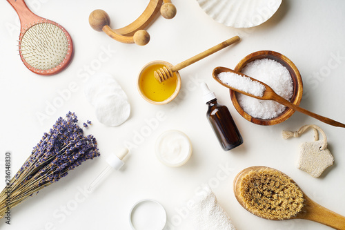 Spa beauty skincare flatlay with lavender and fresh ingredients or homemade beauty products and scrubs. Overhead view, copy space.