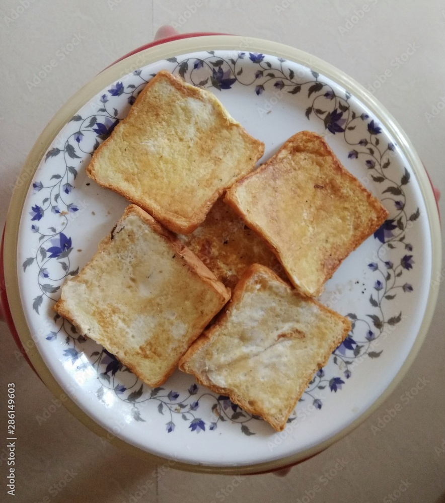 Homemade slices of Bread Egg Toast on a plate