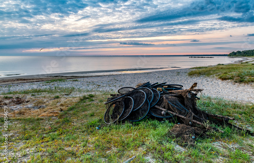 Coastal landscape with a fishing net on sandy beach, Baltic Sea