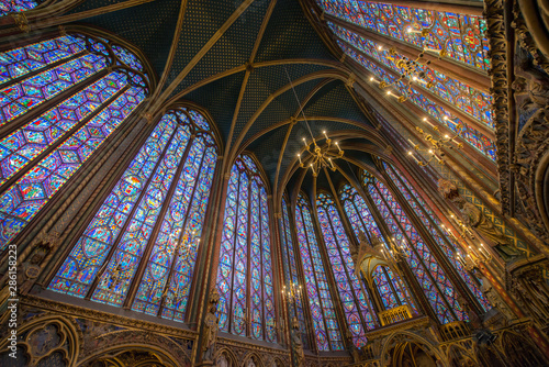 Stained glass window in Sainte Chapelle, Paris, France © Nattawit