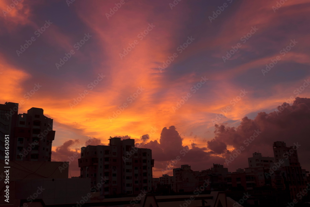 Dramatic city sky a beautiful colors red orange black blue in India