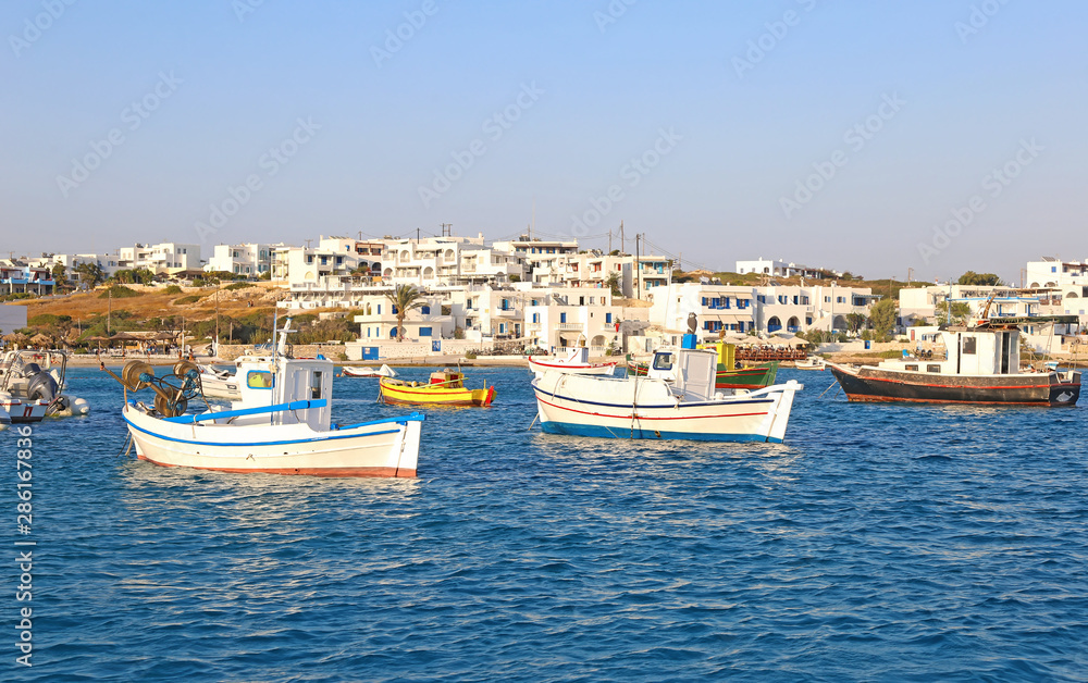 landscape of Ano Koufonisi island Cyclades Greece - traditional fishing boats at the harbor