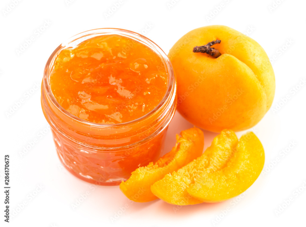 Jar of Homemade Apricot Jam Isolated on a White Background Jar of Homemade Apricot Jam Isolated on a White Background