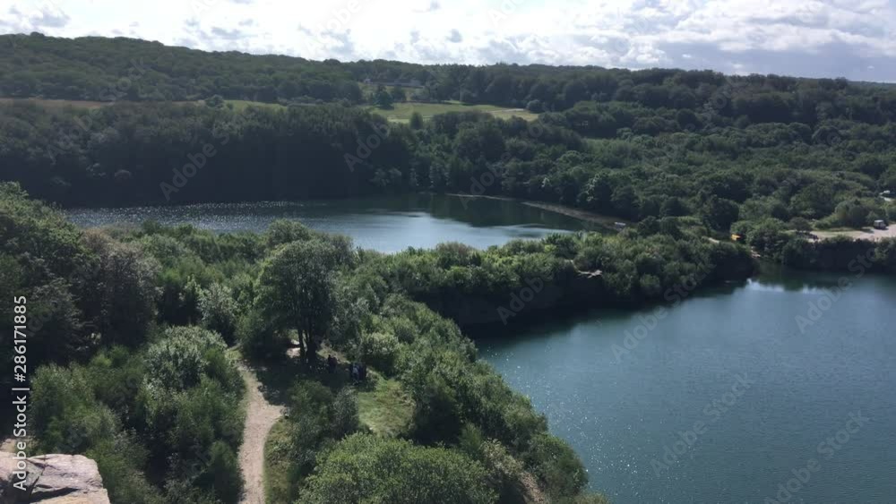 Lakes Opalso and Hammerso, Denmark , Bornholm, Lake surrounded by rocks on the island of Bornholm in Denmark. Opalsøen Lakes Opalso and Hammerso, Denmark , Bornholm, Lake surrounded by rocks on the island of Bornholm in Denmark. Opalsøen