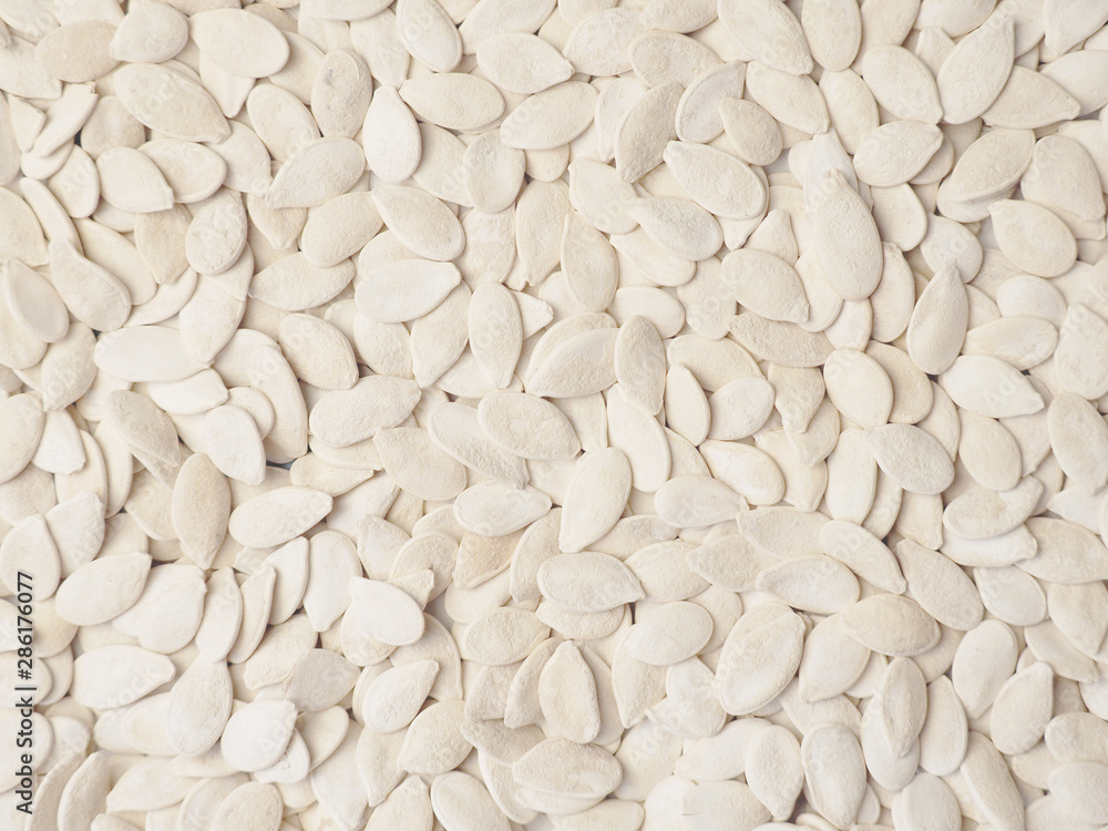 Pumpkin seeds texture, surface, close-up Pumpkin seeds texture, surface, close-up
