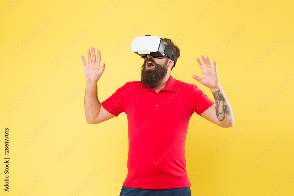 Building your visions. Creating reality. Man play game in VR glasses. Hipster with virtual reality headset. Explore cyberspace. Virtual communication. Virtual simulation. Digital technology