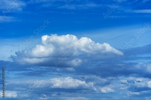 Beautiful background of bright blue sky with white clouds.