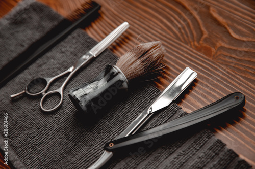 Barbershop background for men beauty salon, hairdresser tools scissors, razor, comb, copy space