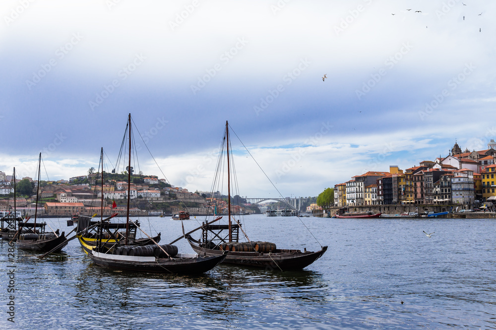 Boats with porto wine in Porto, Portugal. Douro River Boats with porto wine in Porto, Portugal. Douro River