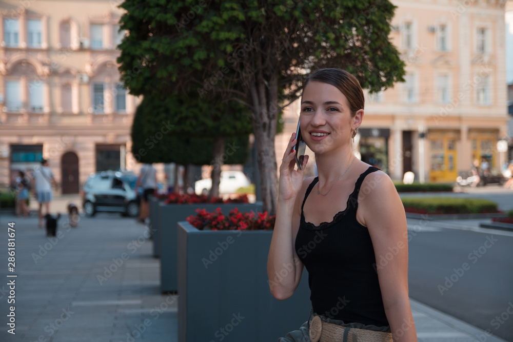 Business woman talking on her mobile phone