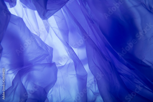 Blue plastic bag texture. Blue silk background
