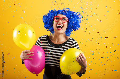 Fun and colorful portrait of woman with blue wig © Mat Hayward