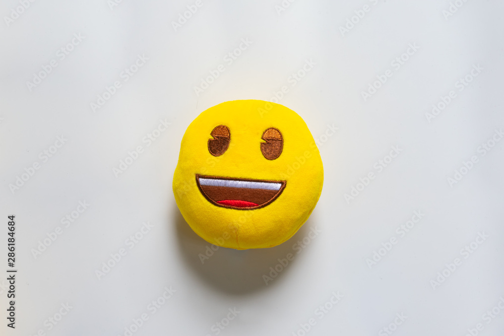 Fototapeta premium Fluffy Yellow Emoji happy and smile isolated on white background, studio photo 