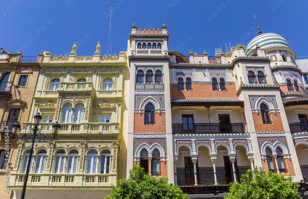 Historic buildings at the Constiruticion Avenue in Sevilla, Spain