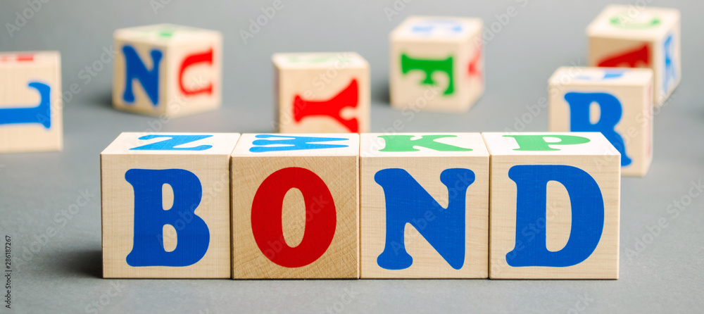 Wooden blocks with the word Bonds. A bond is a security that indicates that the investor has provided a loan to the issuer. Equivalent loan. Unsecured and secured bonds Wooden blocks with the word Bonds. A bond is a security that indicates that the investor has provided a loan to the issuer. Equivalent loan. Unsecured and secured bonds