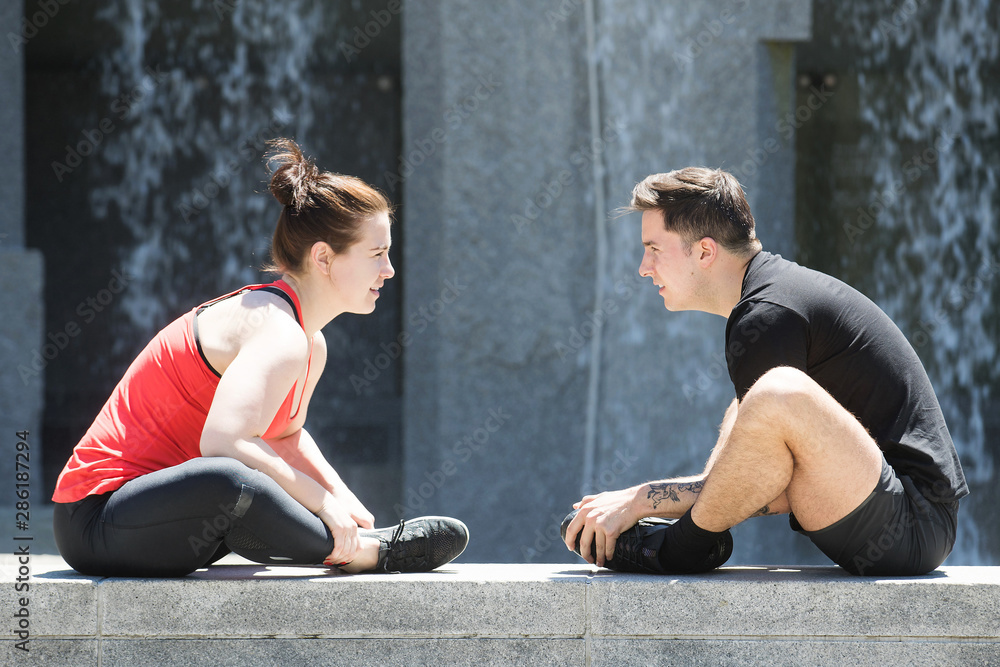Healthy couple stretching in yoga exercise Healthy couple stretching in yoga exercise