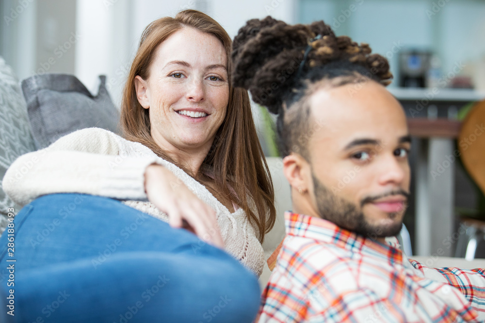 Attractive young couple together at home Attractive young couple together at home