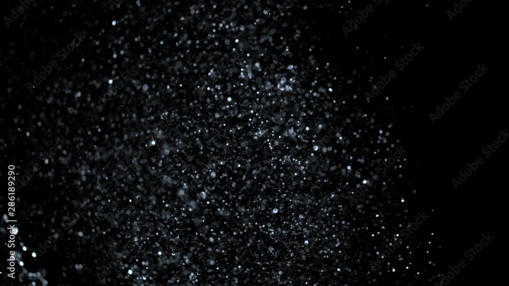 Super Slow Motion Shot of Water Drops Splash at 1000fps Isolated on Black Background. Shooted with High Speed Cinema Camera at 4K. Super Slow Motion Shot of Water Drops Splash at 1000fps Isolated on Black Background. Shooted with High Speed Cinema Camera at 4K.