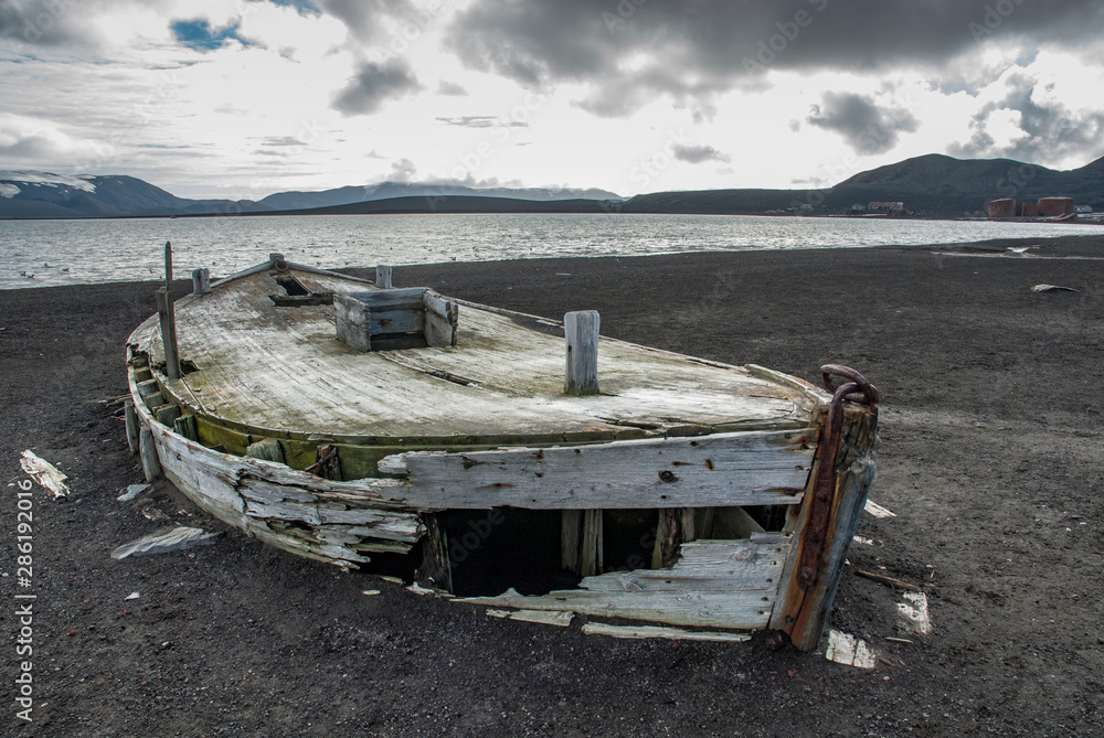 Old whaling boats on the beach of Deception Isla,Antartica Old whaling boats on the beach of Deception Isla,Antartica