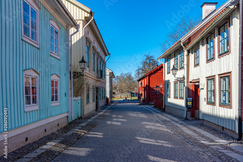 Beautiful old timber houses in Wadkoping historical quarter of Orebro, Sweden photo