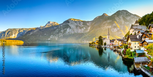 Hallstatt, Austria. Picturesque town on alpine lake Hallstatter See in Austrian Alps mountains. Autumn season.