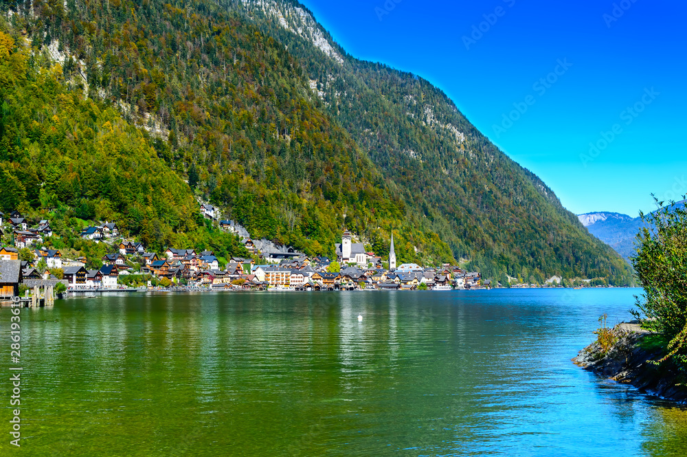 Hallstatt, Austria. Popular town on alpine lake Hallstatter See in Austrian Alps mountains in autumn