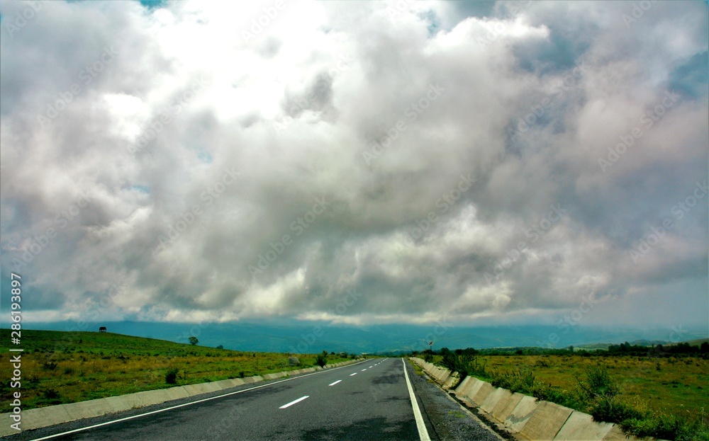 clouds over the road