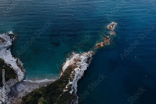 Sea Spit in Capri, Italy. View from the copter. Coastline with the beach and the sea. Nature conservation. View from the sky. The photo was taken by drone quadcopter.