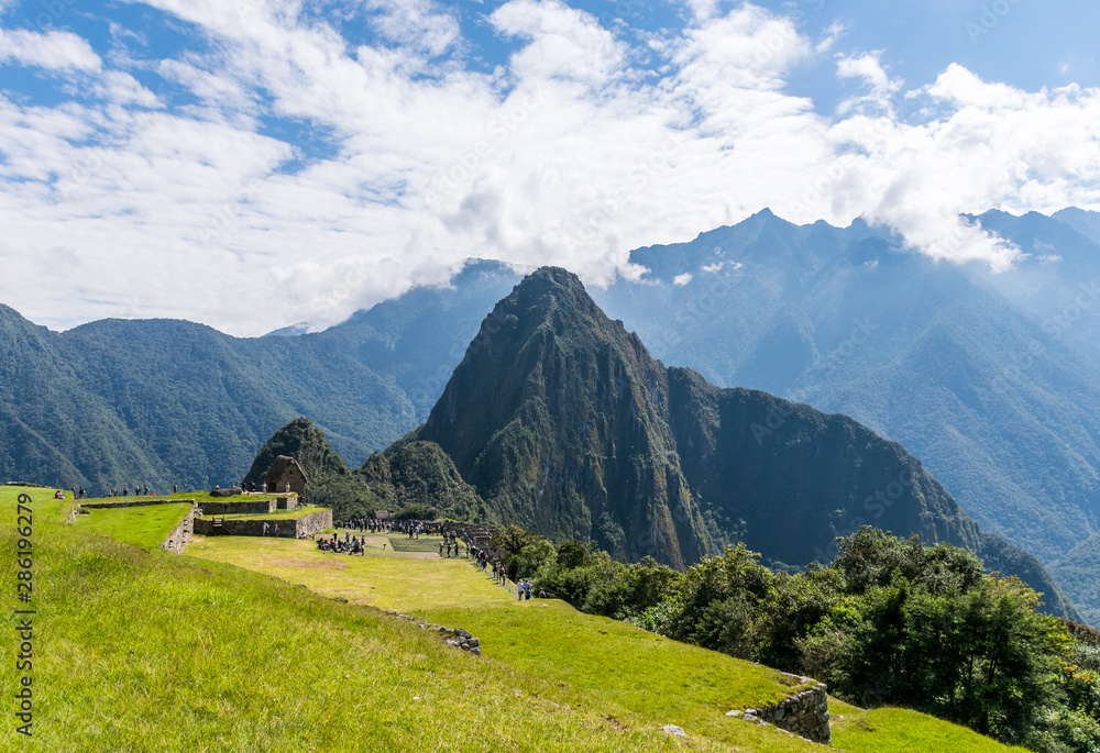 Machu Picchu, Peru - 05/21/2019:  Inca site of Machu Picchu and the surrounding Andes mountains in Peru.
