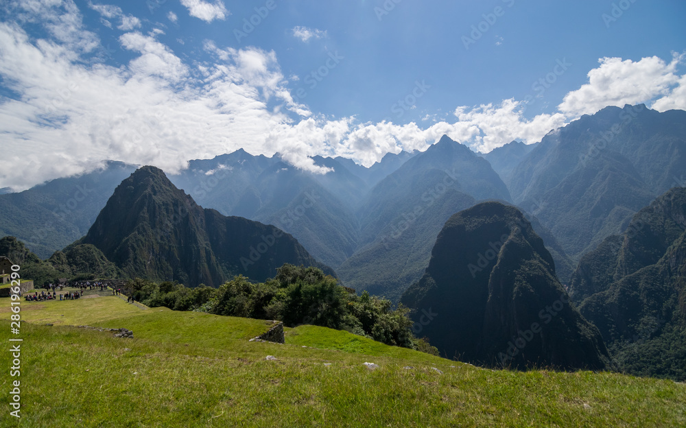 Machu Picchu, Peru - 05/21/2019:  Inca site of Machu Picchu and the surrounding Andes mountains in Peru.