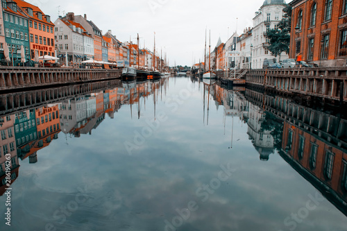 Copenhagen  Denmark - 17 August  2019  Nyhavn pier with color buildings  ships  yachts and other boats in the old part of town of Copenhagen  Denmark