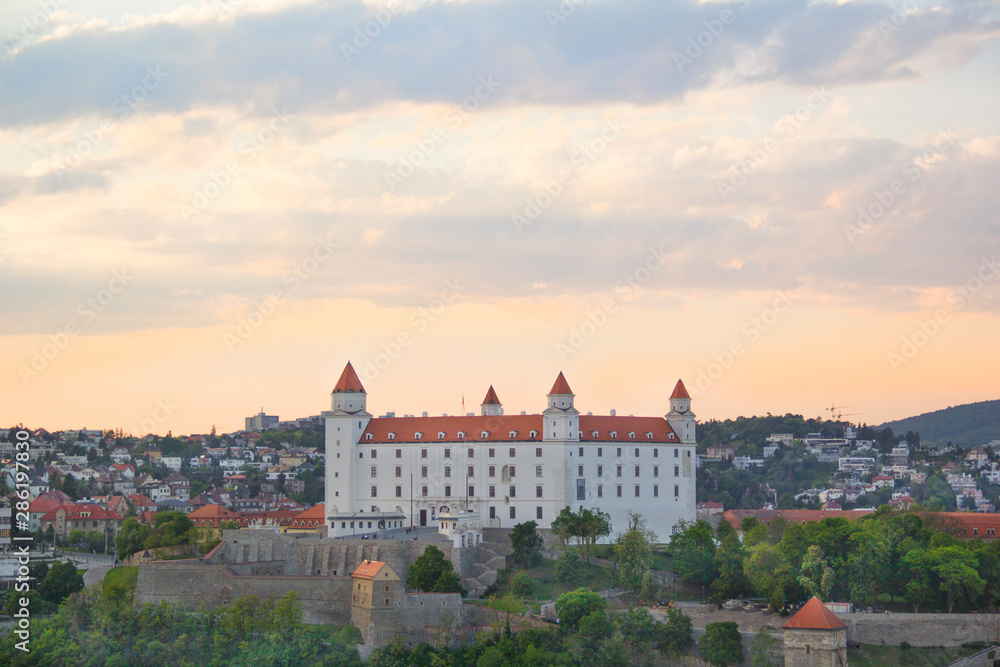 Beautiful view of the Bratislava castle on the banks of the Danube in the old town of Bratislava, Slovakia on a sunny summer day Beautiful view of the Bratislava castle on the banks of the Danube in the old town of Bratislava, Slovakia on a sunny summer day