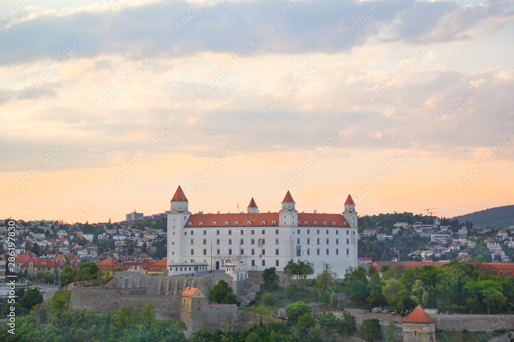 Beautiful view of the Bratislava castle on the banks of the Danube in the old town of Bratislava, Slovakia on a sunny summer day