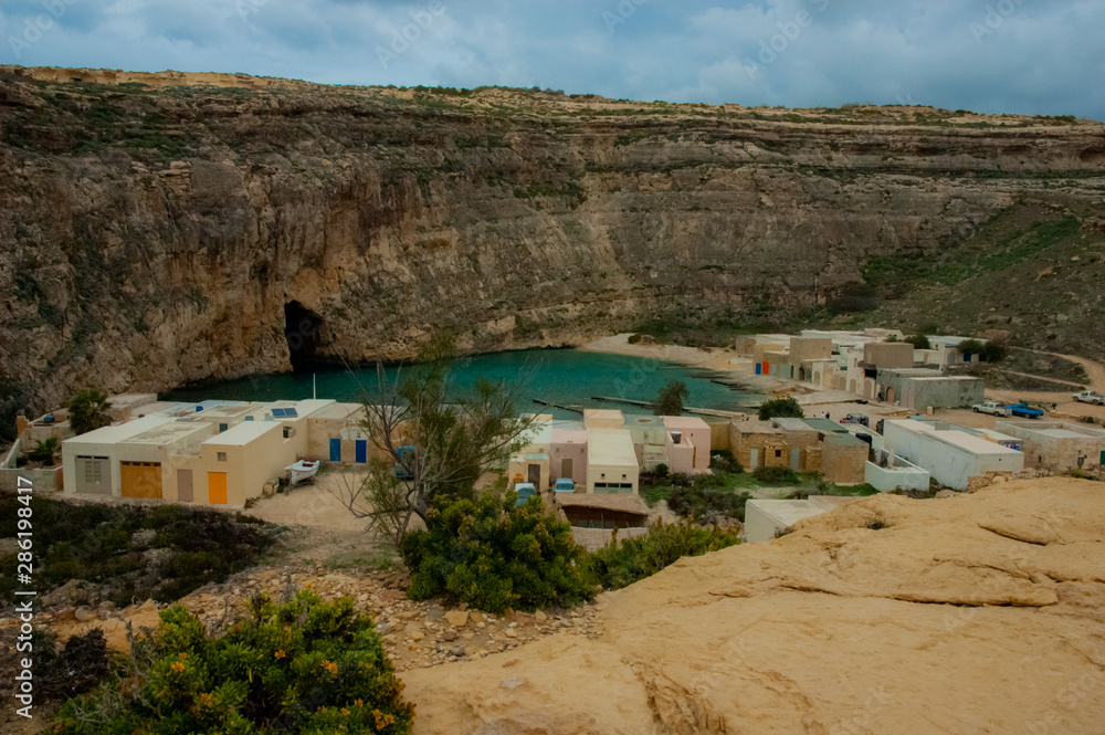 Fototapeta premium Malta beach with rocks and blue water