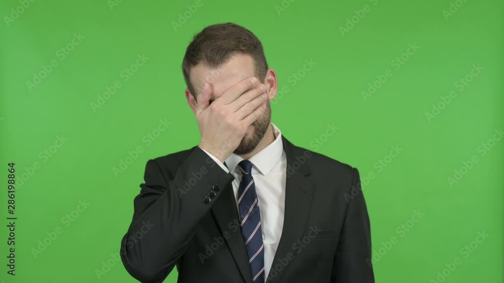 Ambitious Businessman getting Upset against Chroma Key Ambitious Businessman getting Upset against Chroma Key