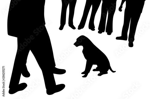 Dog sitting and people around dog