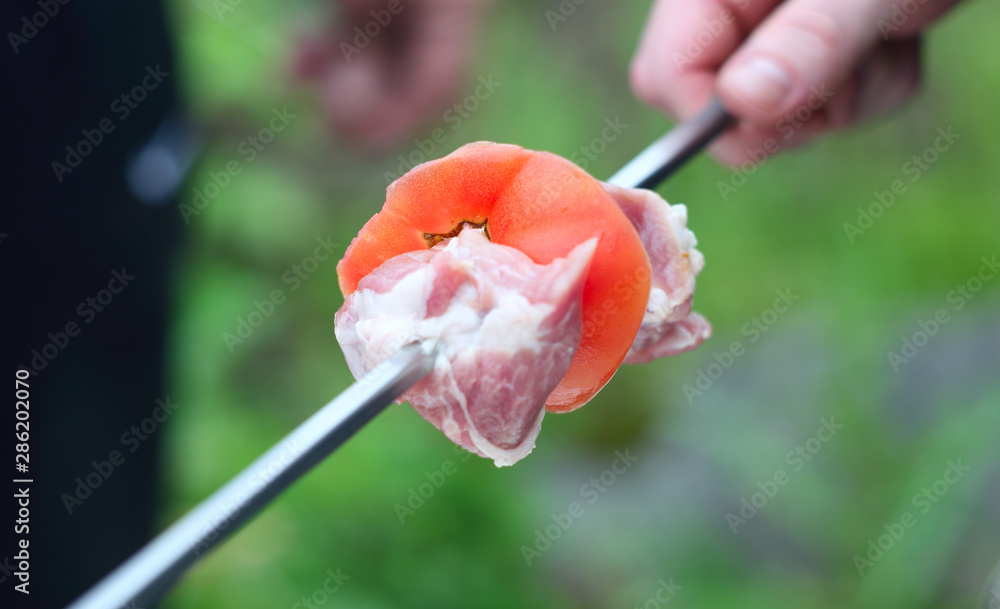 Grilling shashlik on barbecue grill Grilling shashlik on barbecue grill