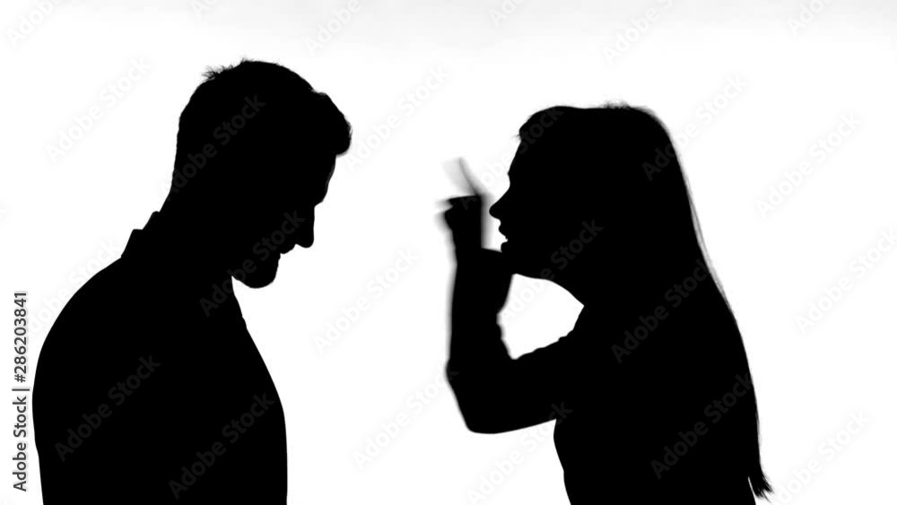 Silhouette of Woman Fighting with Man against White Background Silhouette of Woman Fighting with Man against White Background