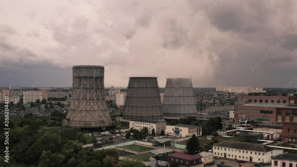 Smoke from chimneys of thermal power plant oe station, aerial view from drone Smoke from chimneys of thermal power plant oe station, aerial view from drone