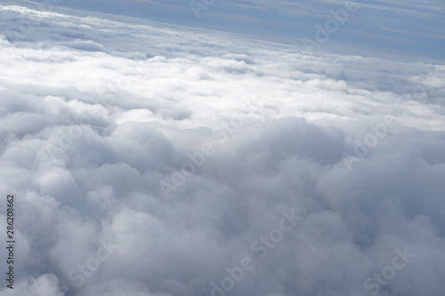 Fototapeta Naklejka Na Ścianę i Meble -  View Clouds through the plane window