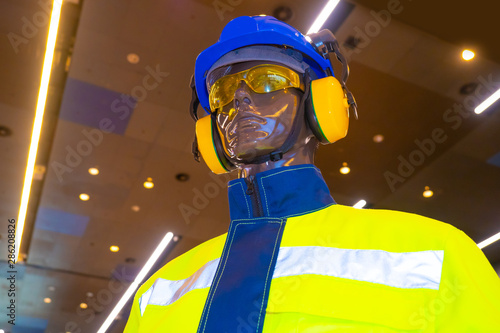 The dummy is dressed in a p...