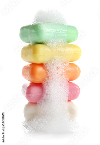Stack of soap bars on white background