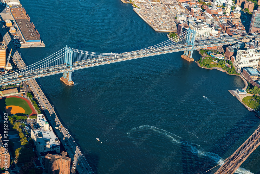 Aerial view of New York City with a view of the Brooklyn and Manhattan Bridges