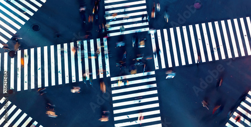 Fotografie Aerial view of people crossing a big intersection in Ginza, Tokyo, Japan at nigh